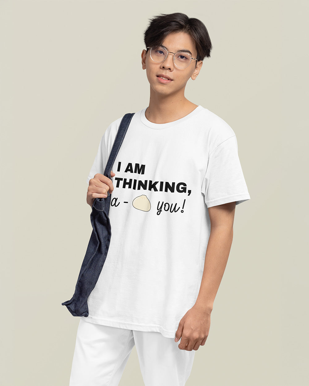 Male model showing relaxed fit white kawaii food graphic t-shirt for modern teen and young adult streetwear.