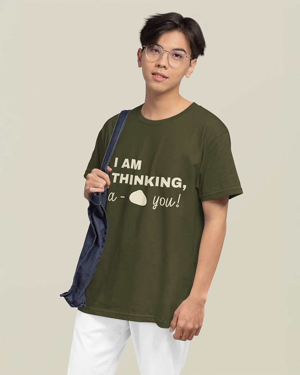 Male model showing relaxed fit sage green kawaii food graphic t-shirt for modern teen and young adult streetwear.